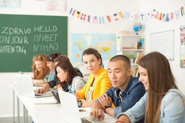 Photo of College students in a classroom.