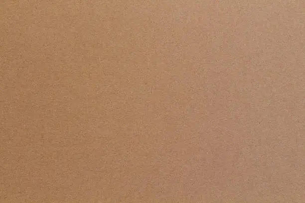 Photo of Textured Paper ,Flat brown cardboard background texture
