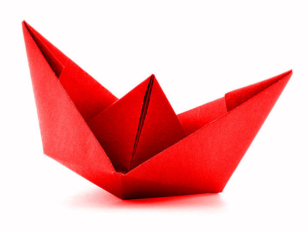 istock Red paper ship, origami sail boat isolated on white background 502175772