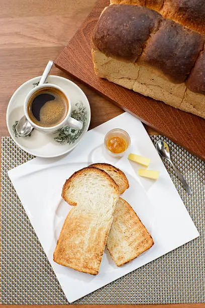 Oriental breakfast set in Malaysia consisting of toast bread and coffee