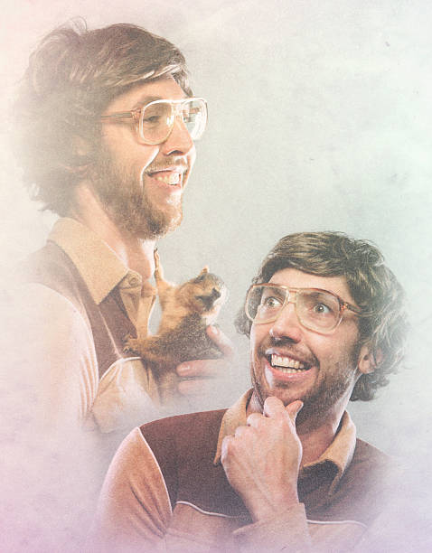 Studio portraits of a confused nerdy guy, shot on a white background and he is wearing a strange glasses.