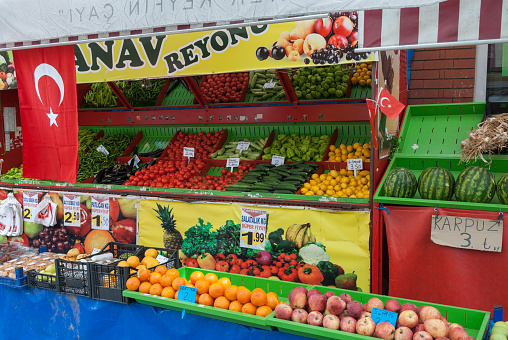 Ayvalik, Turkey - April 23, 2014: A  fruiterer's shop in the open market of the city. 