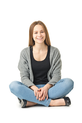 A DSLR photo of teenager girl. Full length. Pictures isolated on white backround.