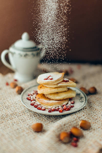 istock White pancake with chocolate and pomegranate, Christmas background 502185006