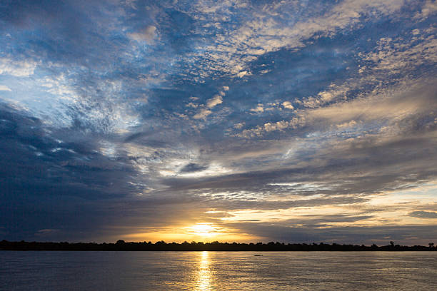 istock Colorful sunset on the river Amazon in the rainforest, Brazil 502187006