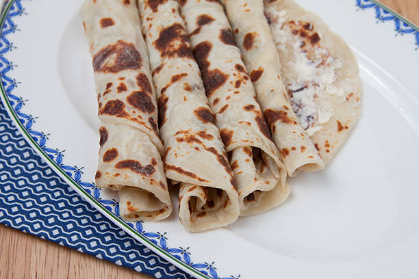 istock Several pieces of rolled lefse - close up 502190978