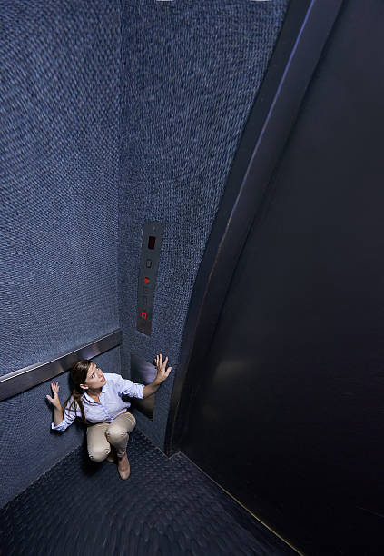 Feeling the walls closing in Distorted shot of a young woman trapped in an elevatorhttp://195.154.178.81/DATA/i_collage/pi/shoots/783578.jpg ugly people crying stock pictures, royalty-free photos & images