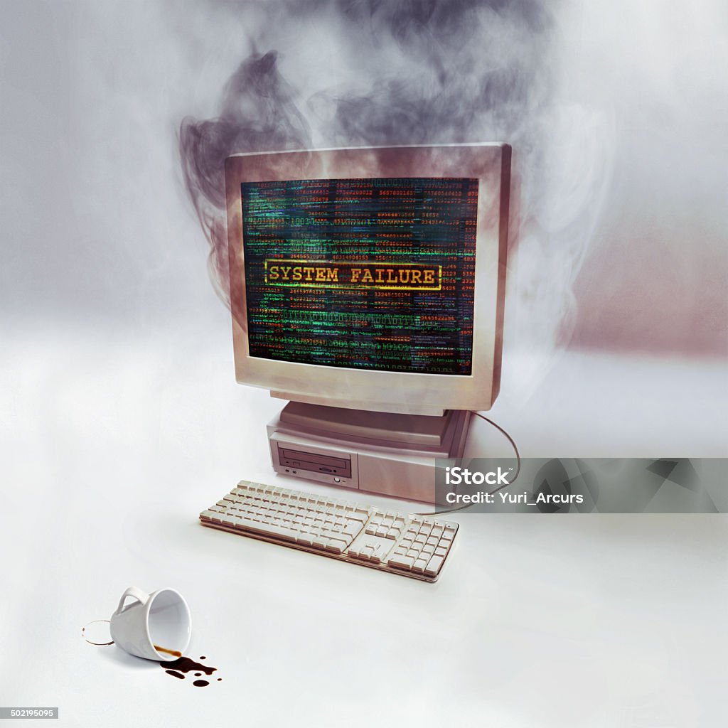 This computer's time is up Shot of a desktop computer smoking after burning outhttp://195.154.178.81/DATA/i_collage/pi/shoots/783567.jpg Computer Stock Photo