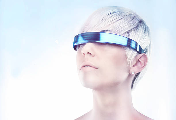 Envisioning the future A futuristic view of a young woman with glasseshttp://195.154.178.81/DATA/i_collage/pi/shoots/783655.jpg head mounted display stock pictures, royalty-free photos & images