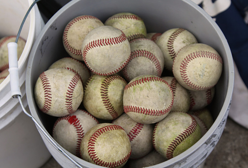 Bucket of practice baseballs