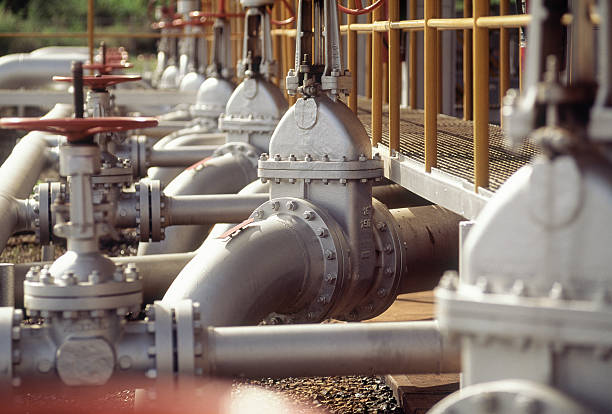 Oil Industry Valves and gauges at natural gas refinery, Venezuela gauge photos stock pictures, royalty-free photos & images