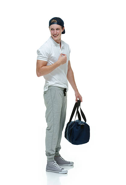 istock Young man with gym bag 502213330