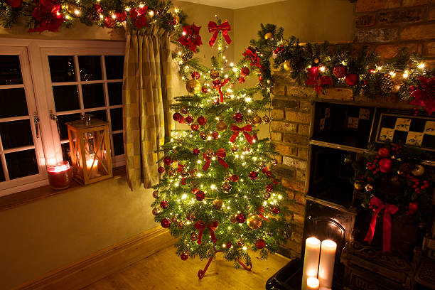istock Traditional Christmas Tree with Presents in Warm Rustic Room Set 502214376