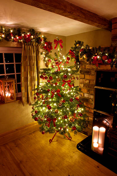 istock Traditional Christmas Tree with Presents in Warm Rustic Room Set 502214392