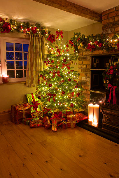 istock Traditional Christmas Tree with Presents in Warm Rustic Room Set 502214650