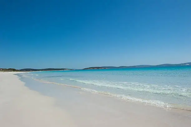 Beautiful Tropical looking White Sandy Goodes Beach in Albany, Western Australia, overlooking deep sea water bay of King George Sound, blue sky, copy space.