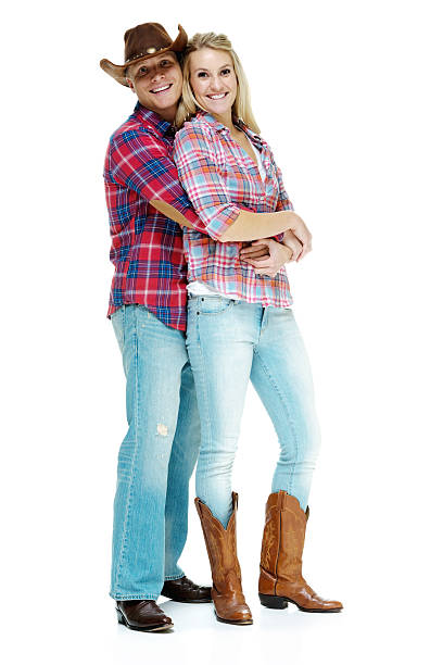 istock Smiling cowboy couple embracing 502215794