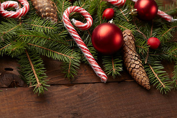 istock Christmas tree branch, candy, cones, balls on the background of 502216726