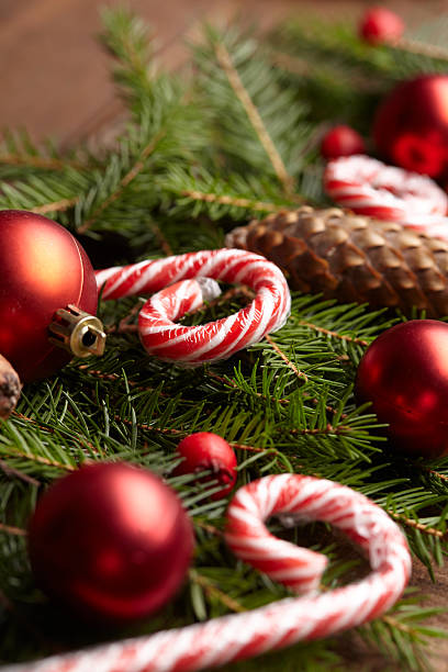 istock Christmas tree branch, candy, cones, balls on the background of 502216956