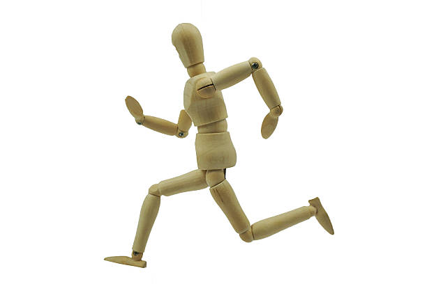 istock Figure doll in action on white backgound. 502217612