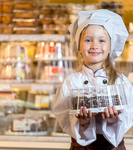 20+ Beautiful Girl Selling Pastry Stock Photos, Pictures & Royalty-Free ...