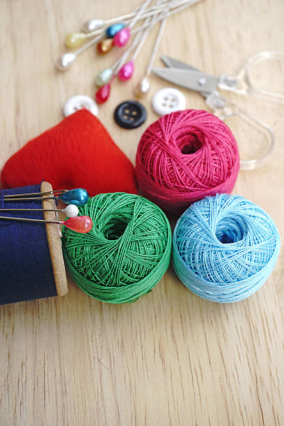 istock sewing kit, needles, thread and measuring tape 502219595