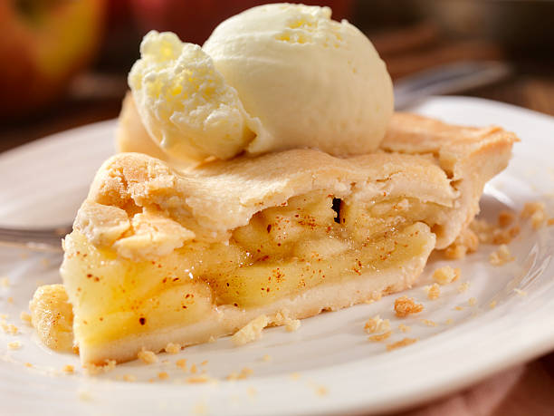 Apple Pie with Vanilla Ice Cream Apple Pie with Vanilla Ice Cream -Photographed on Hasselblad H3D2-39mb Camera apple pie a la mode stock pictures, royalty-free photos & images