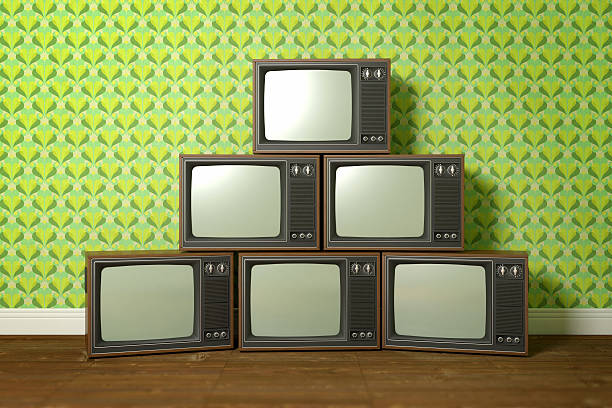 istock Group of old televisions stacked as a pyramid 502220139
