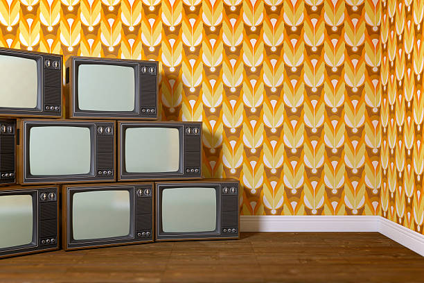 istock Group of old televisions stacked as a pyramid 502220141