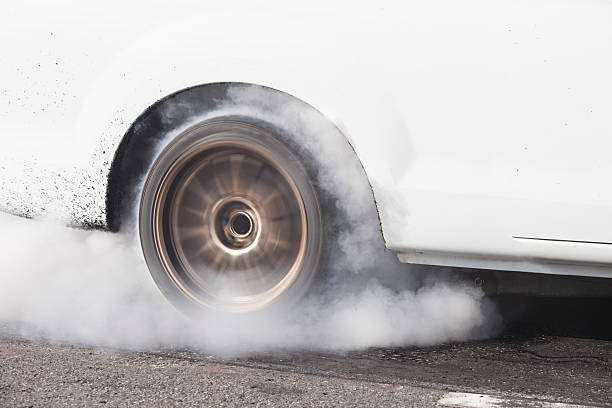 istock car burns rubber for the race 502220996