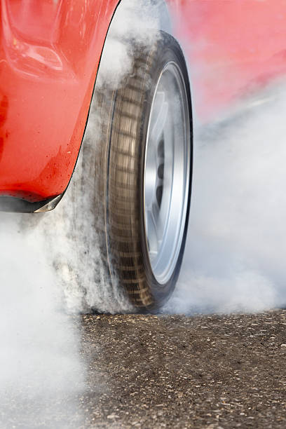 istock car burns rubber for the race 502221056