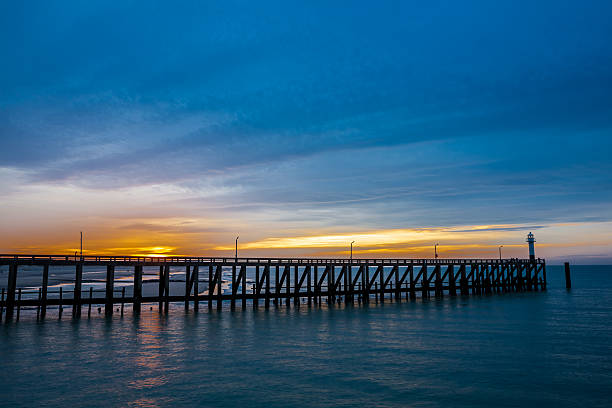 istock the pier whit light pole at the sea 502221492