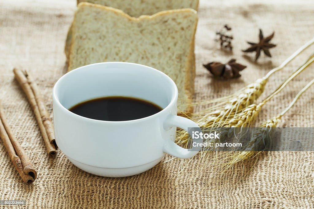 Black coffee cup on sackcloth. Black coffee  cup on sackcloth. 2015 Stock Photo