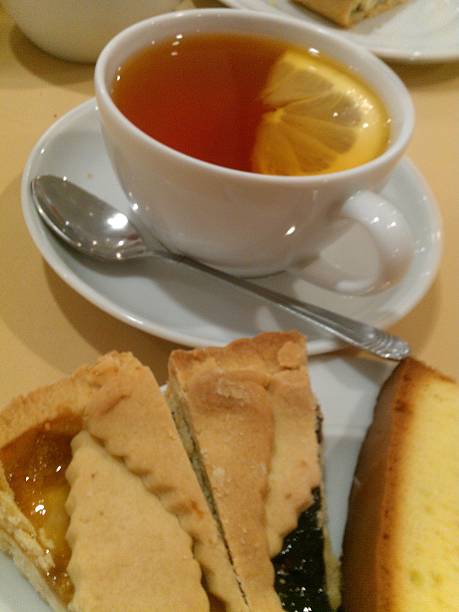 istock Breakfast Table Arrangement With Cake And Tea 502224153