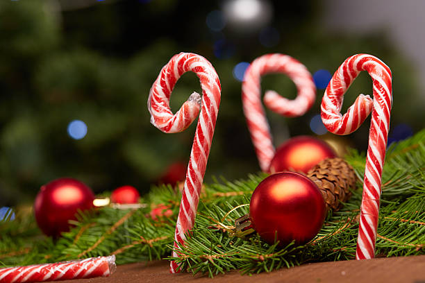 istock Christmas tree branch, candy, cones, balls 502224232