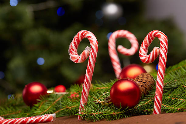 istock Christmas tree branch, candy, cones, balls 502224308