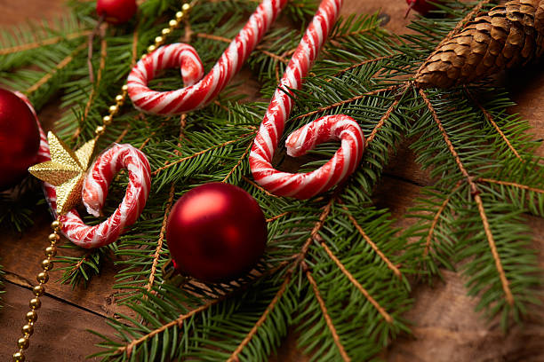 istock Christmas tree branch, candy, cones, balls 502224944