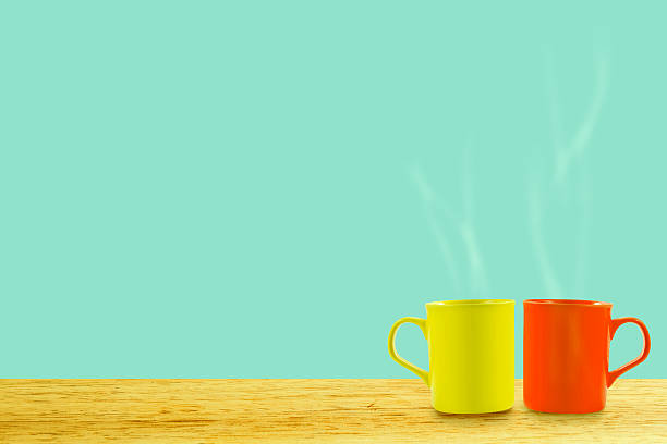 istock Double mug with hot coffee on wood table vintage tone 502225096
