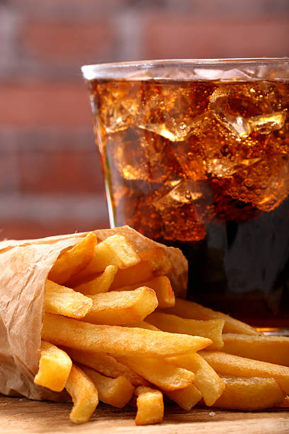 istock French fries and coke with ice 502245584