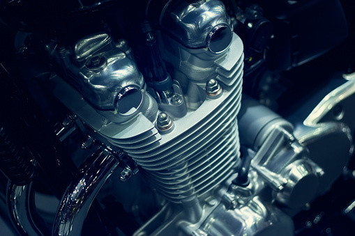 Motorcycle engine closeup on dark background