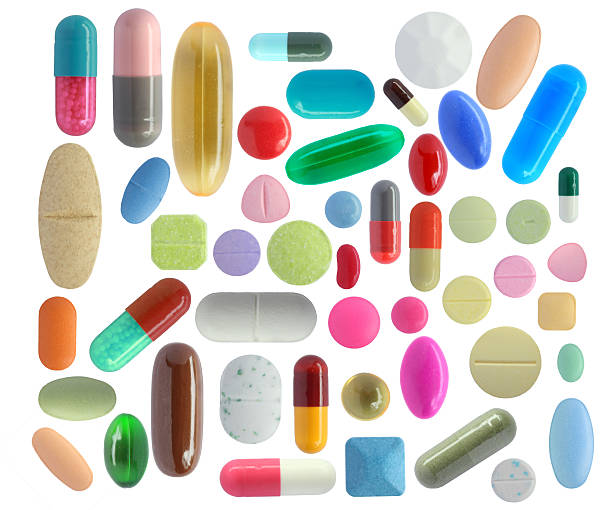 istock Colorful pills isolated on white background 502247432