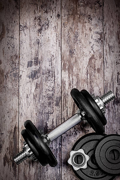 istock Dumbbells on the wood 502248426