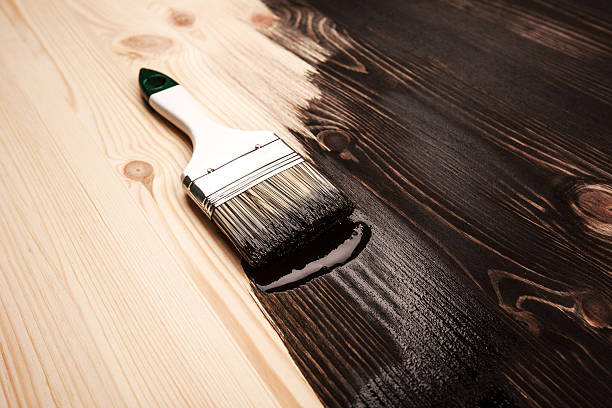 istock Half painted wooden surface 502250172
