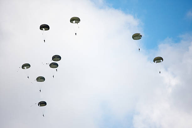 istock parachutists in the sky 502250220