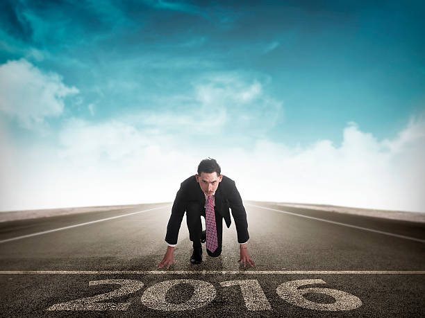istock Happy new year 2016. young man running 502252036