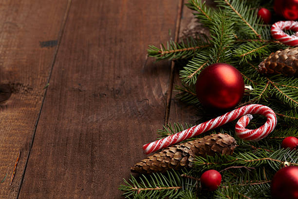 istock Christmas tree branch, candy, cones, balls on the background of 502253142