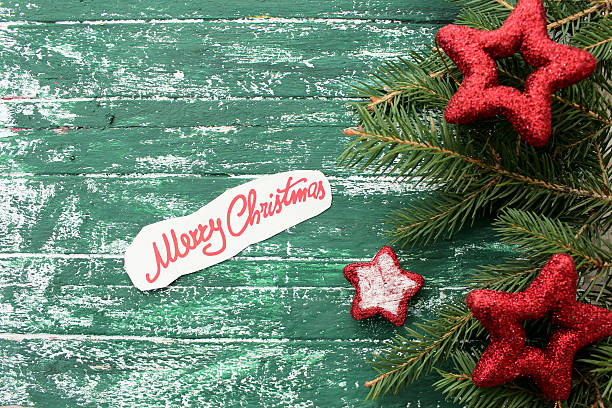 istock Christmas decoration on green background 502253200
