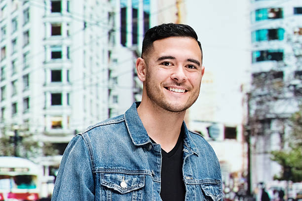 istock Happy man outdoors in the city and looking at camera 502253582