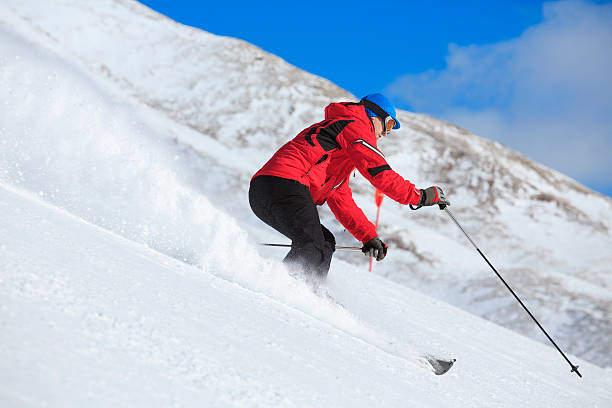 istock Men snow skier  skiing carving techniques at high speed 502253632