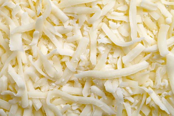 grated cheese background stock photo